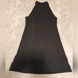 Black mini dress featuring a halter neckline and an A-line silhouette Large